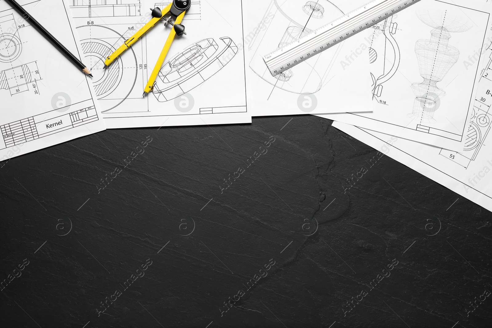 Photo of Different engineering drawings, ruler, divider and pencil on grey textured table, flat lay. Space for text