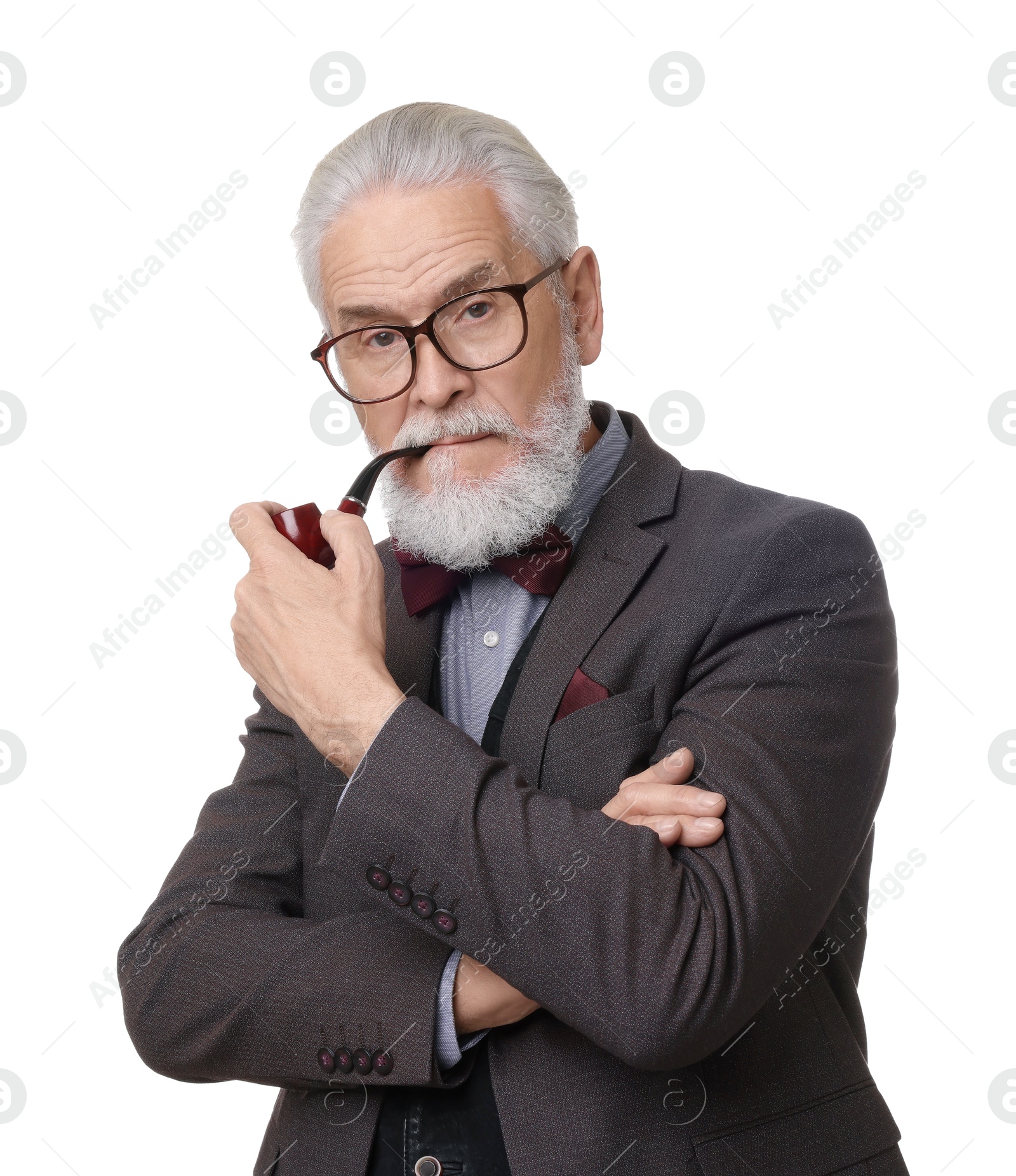 Photo of Portrait of elegant bearded gentleman with tobacco pipe on white background