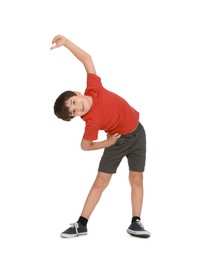 Photo of Boy doing exercise on white background. Sport activity