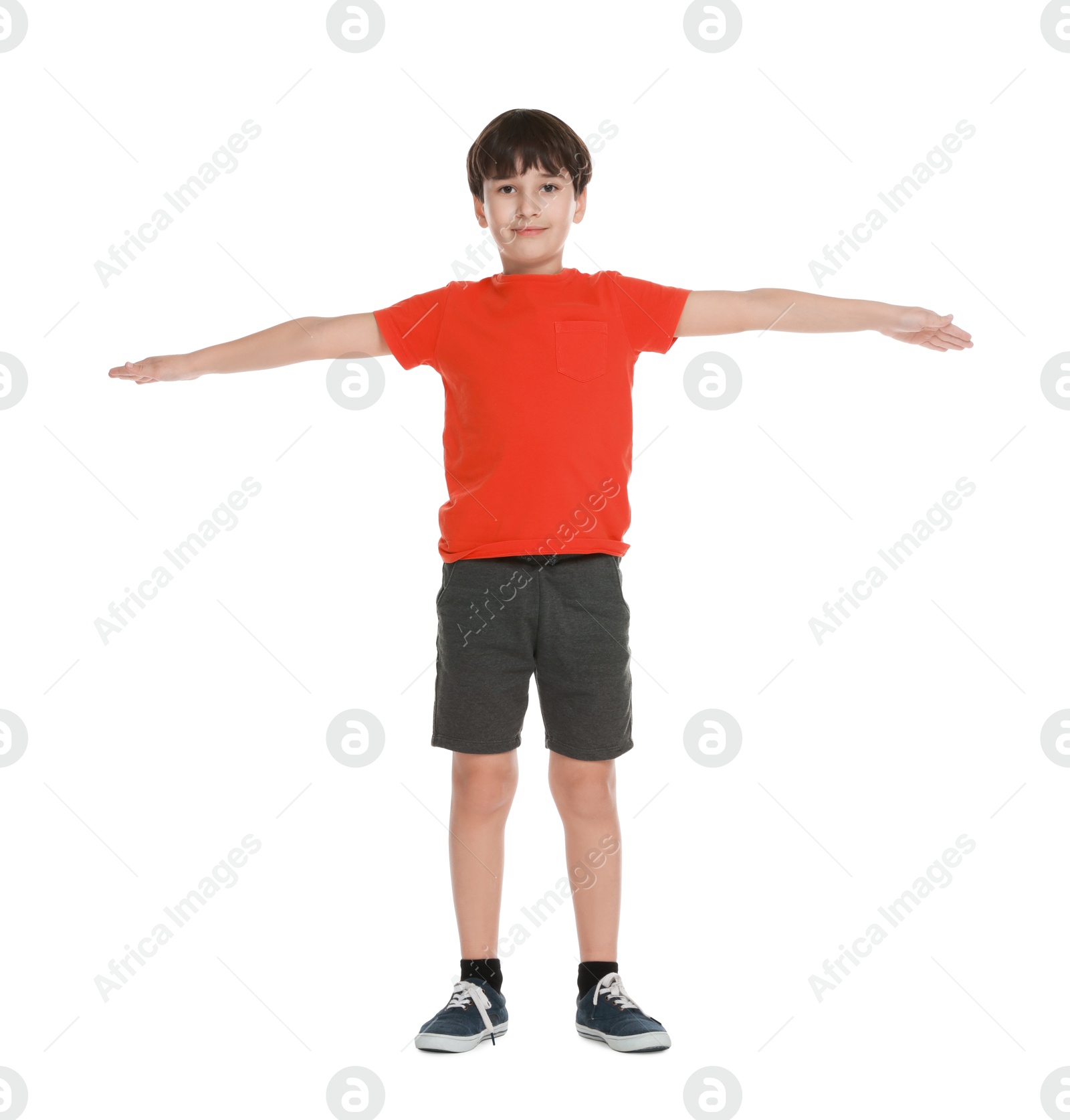 Photo of Boy doing exercise on white background. Sport activity