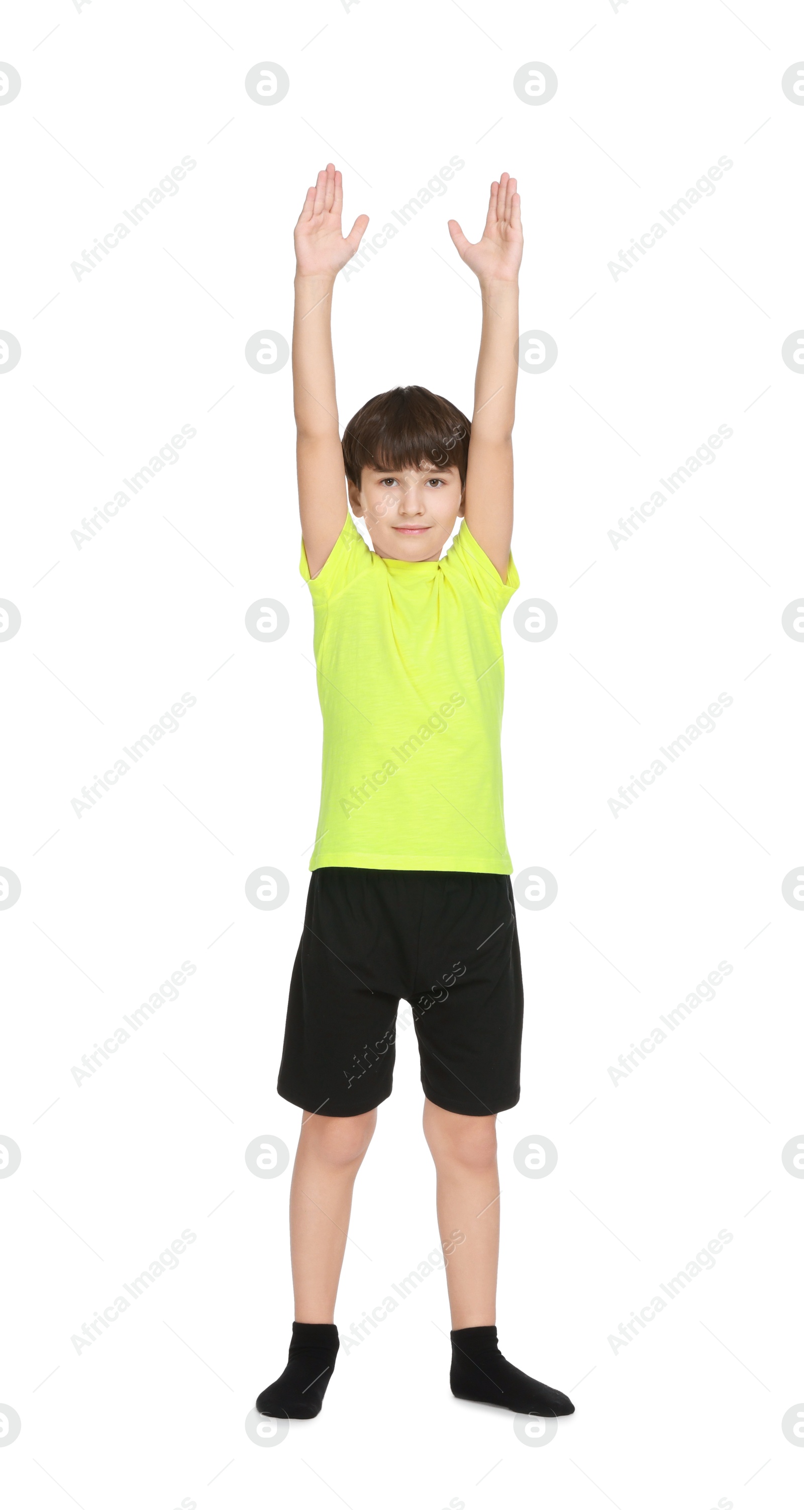 Photo of Boy doing exercise on white background. Sport activity