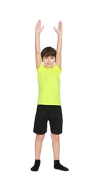 Photo of Boy doing exercise on white background. Sport activity