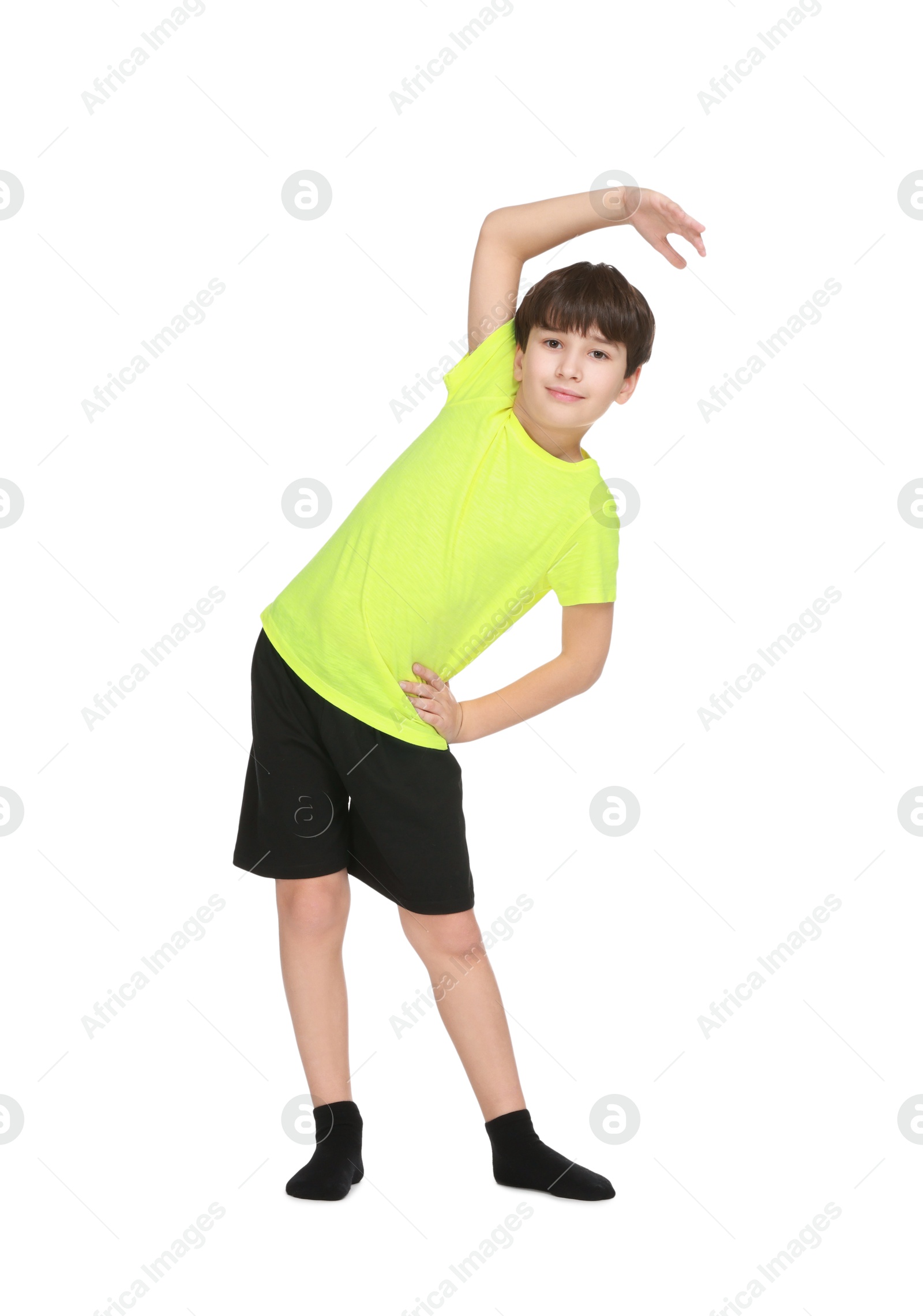 Photo of Boy doing exercise on white background. Sport activity