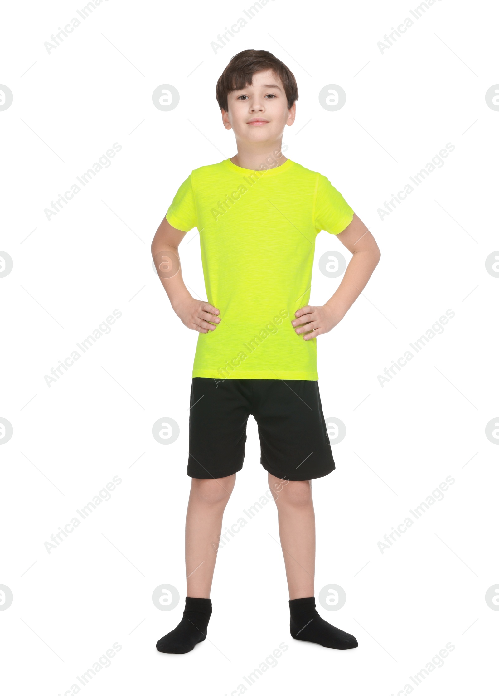 Photo of Boy doing exercise on white background. Sport activity