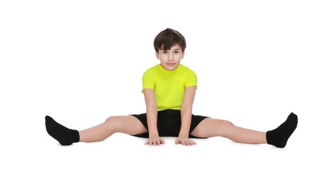 Photo of Boy doing exercise on white background. Sport activity