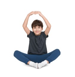 Photo of Boy doing exercise on white background. Sport activity