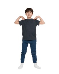 Photo of Boy doing exercise on white background. Sport activity