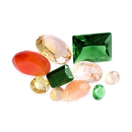 Photo of Different colorful shiny gemstones isolated on white