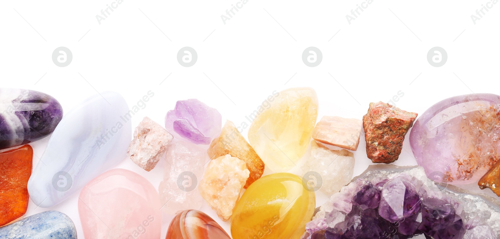 Photo of Different natural mineral stones isolated on white, top view