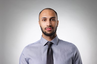 Photo of Portrait of businessman on light gray background