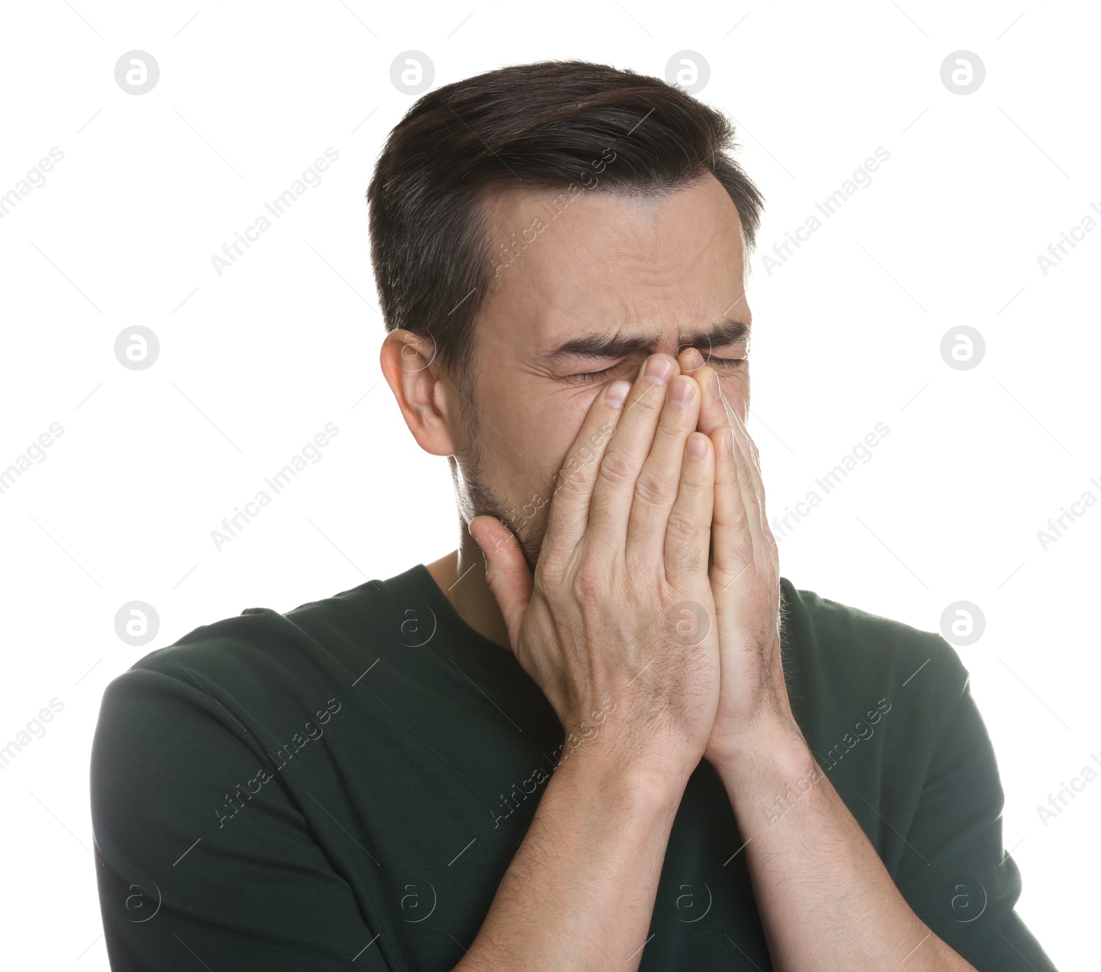 Photo of Portrait of sad man crying on white background