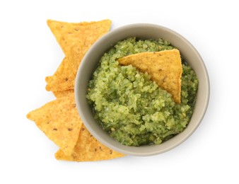 Photo of Delicious homemade green salsa with nachos isolated on white, top view