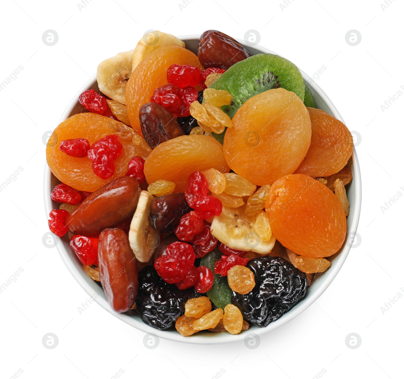 Photo of Mix of different dried fruits in bowl isolated on white, top view