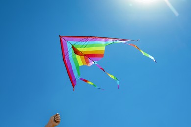 Photo of Man with colorful kite on sunny day, closeup