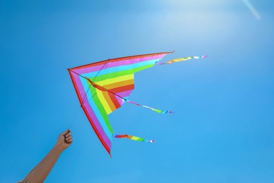Photo of Man with colorful kite on sunny day, closeup