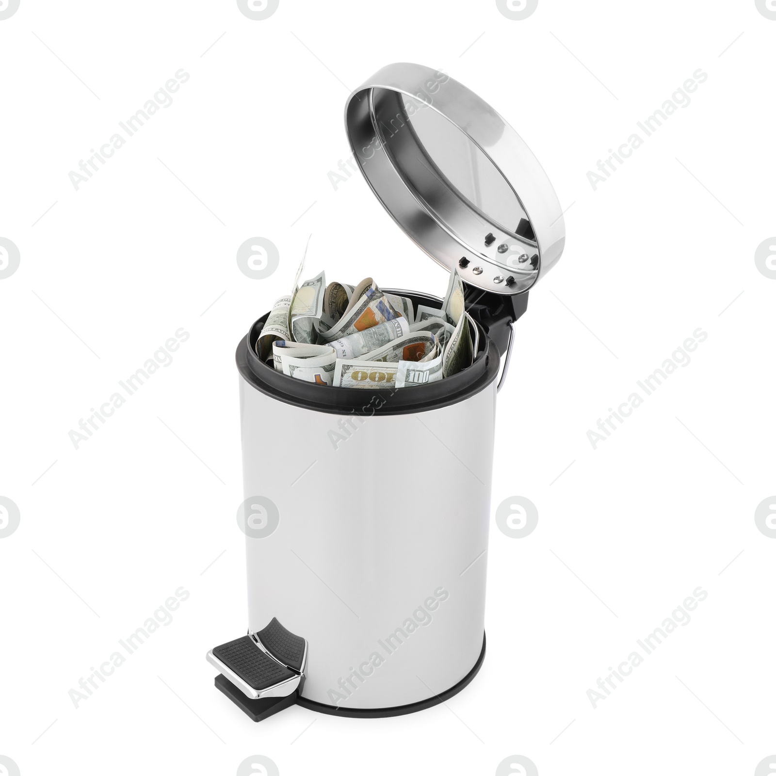 Photo of Dollar banknotes in trash bin on white background