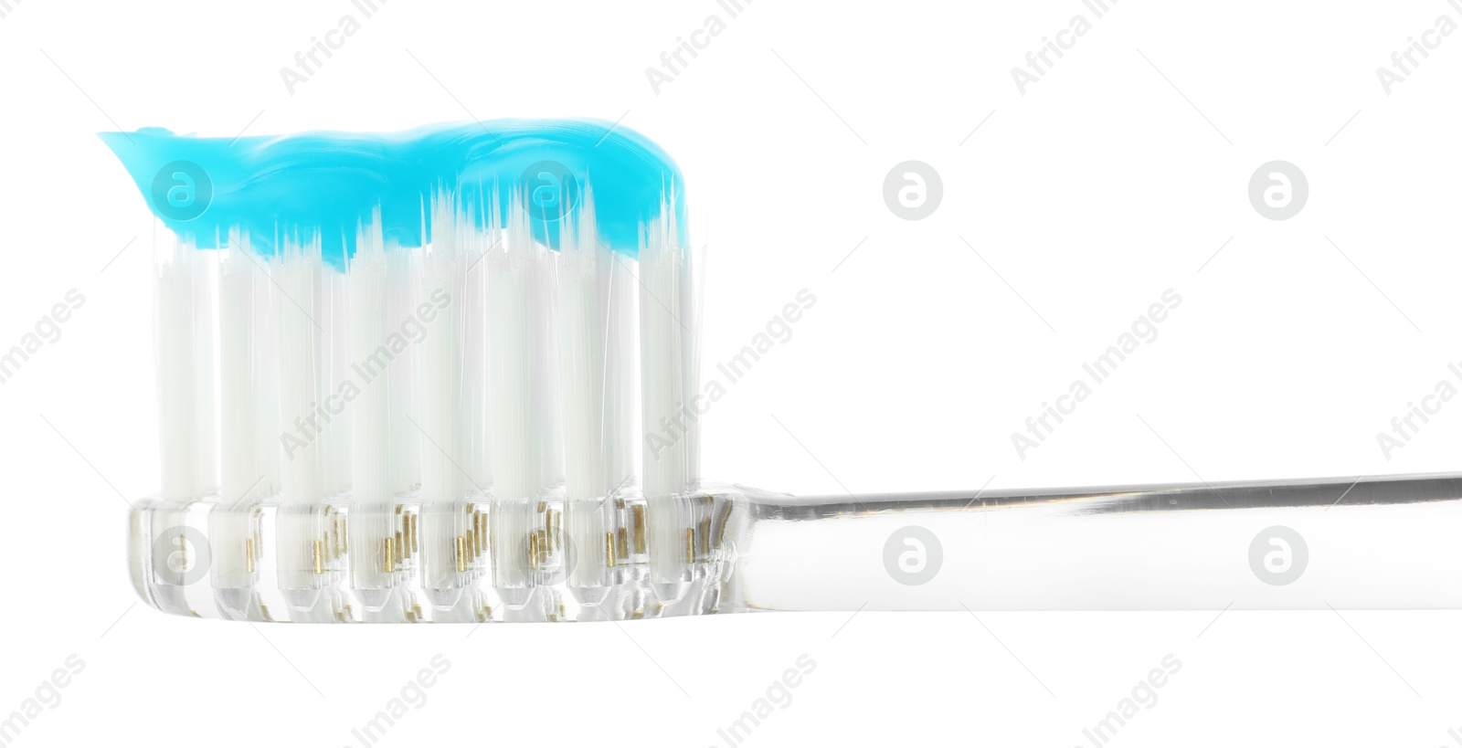 Photo of One toothbrush with toothpaste in air isolated on white