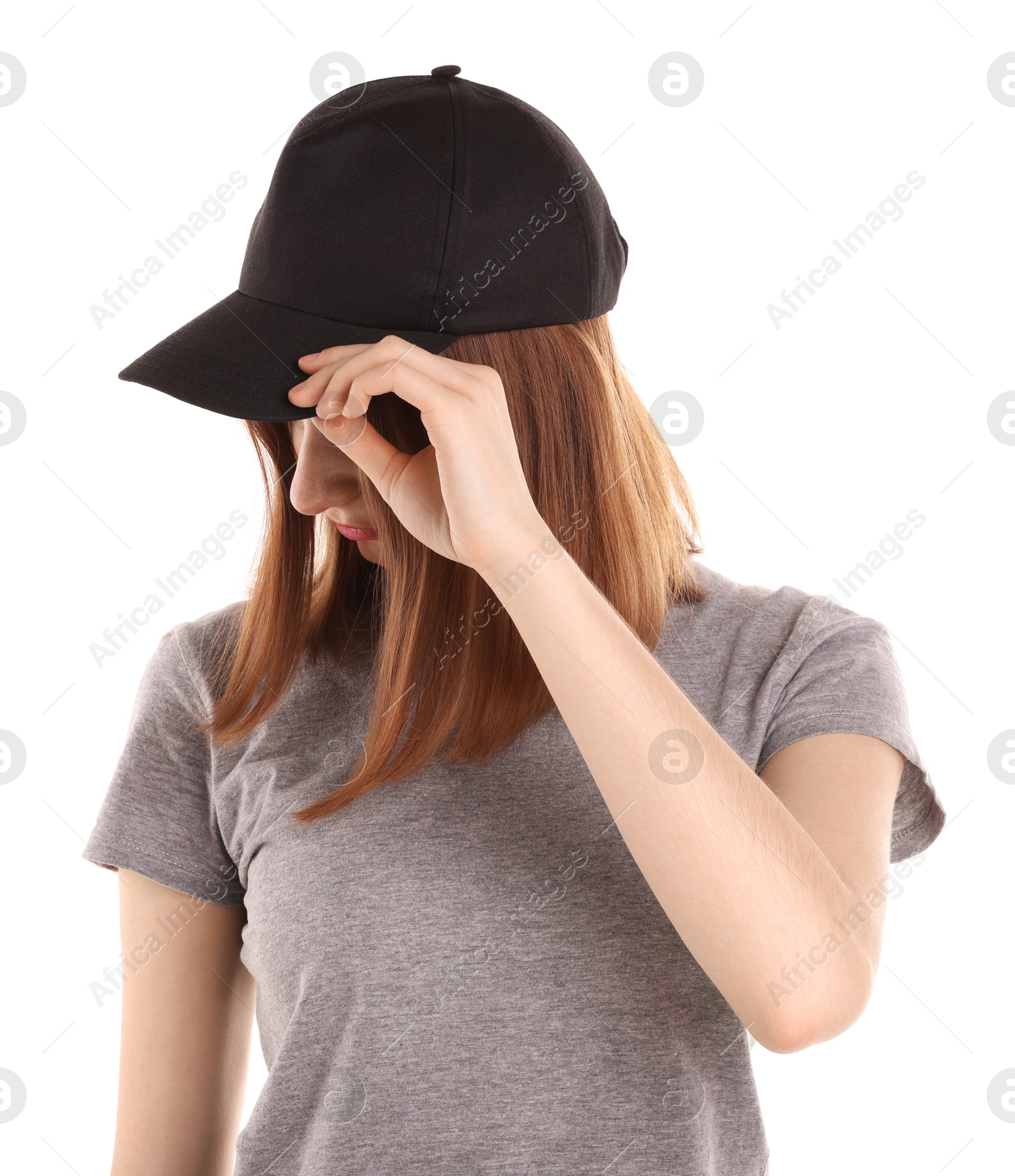 Photo of Woman in stylish baseball cap on white background. Mockup for design