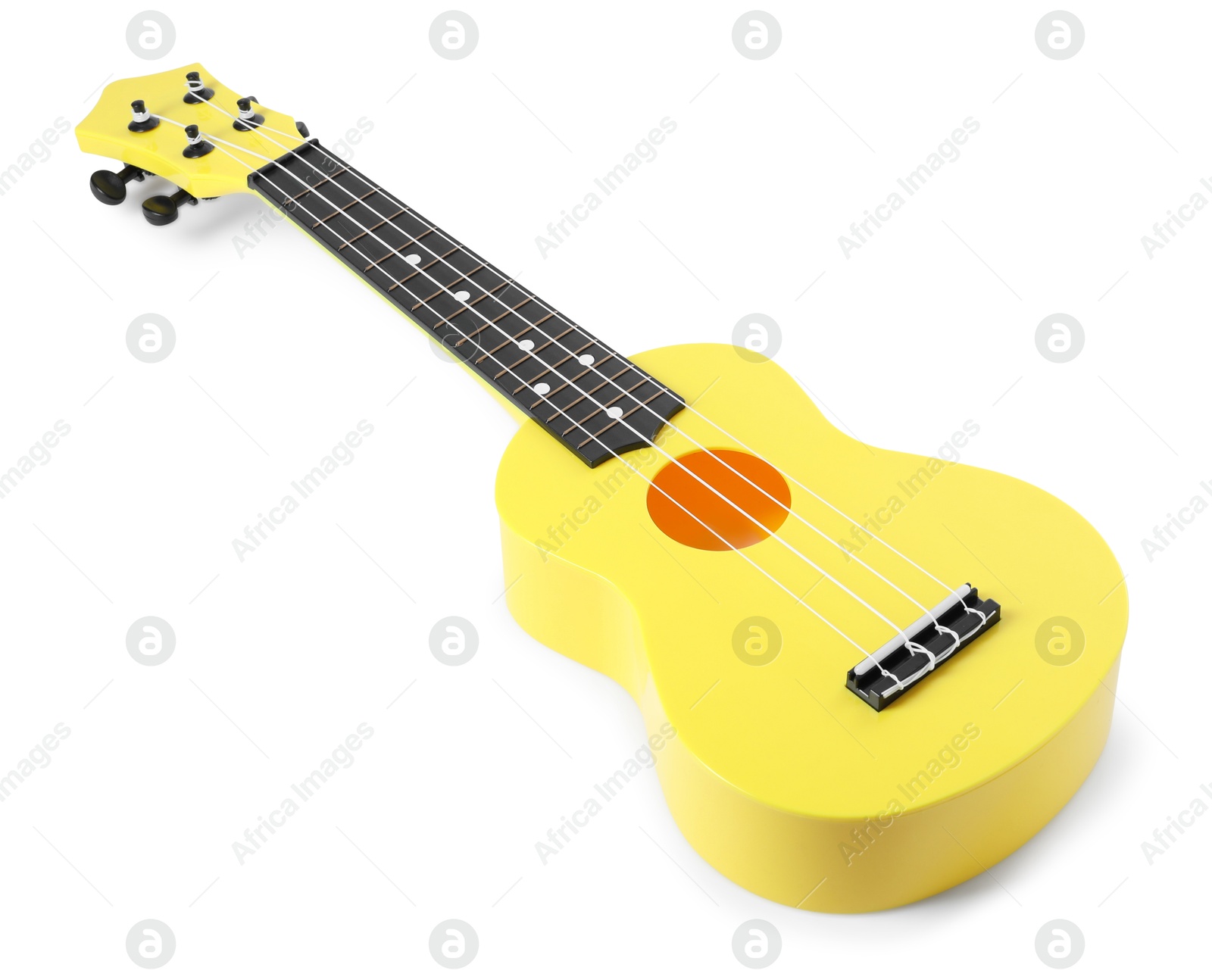 Photo of One ukulele isolated on white. String musical instrument