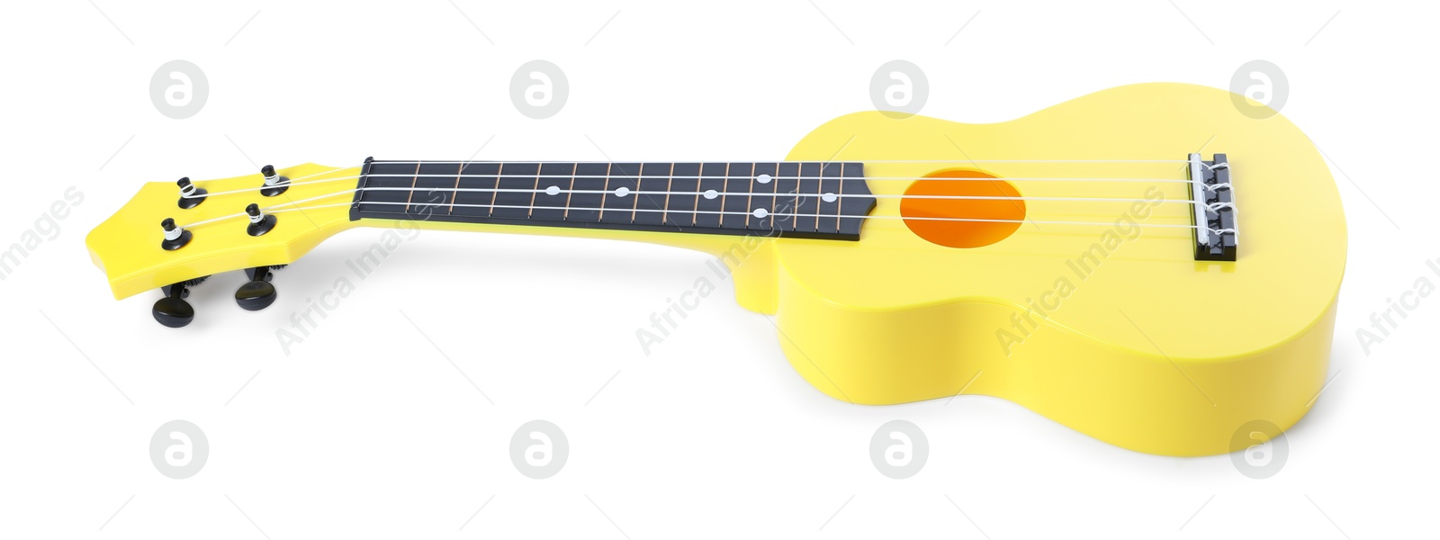 Photo of One ukulele isolated on white. String musical instrument