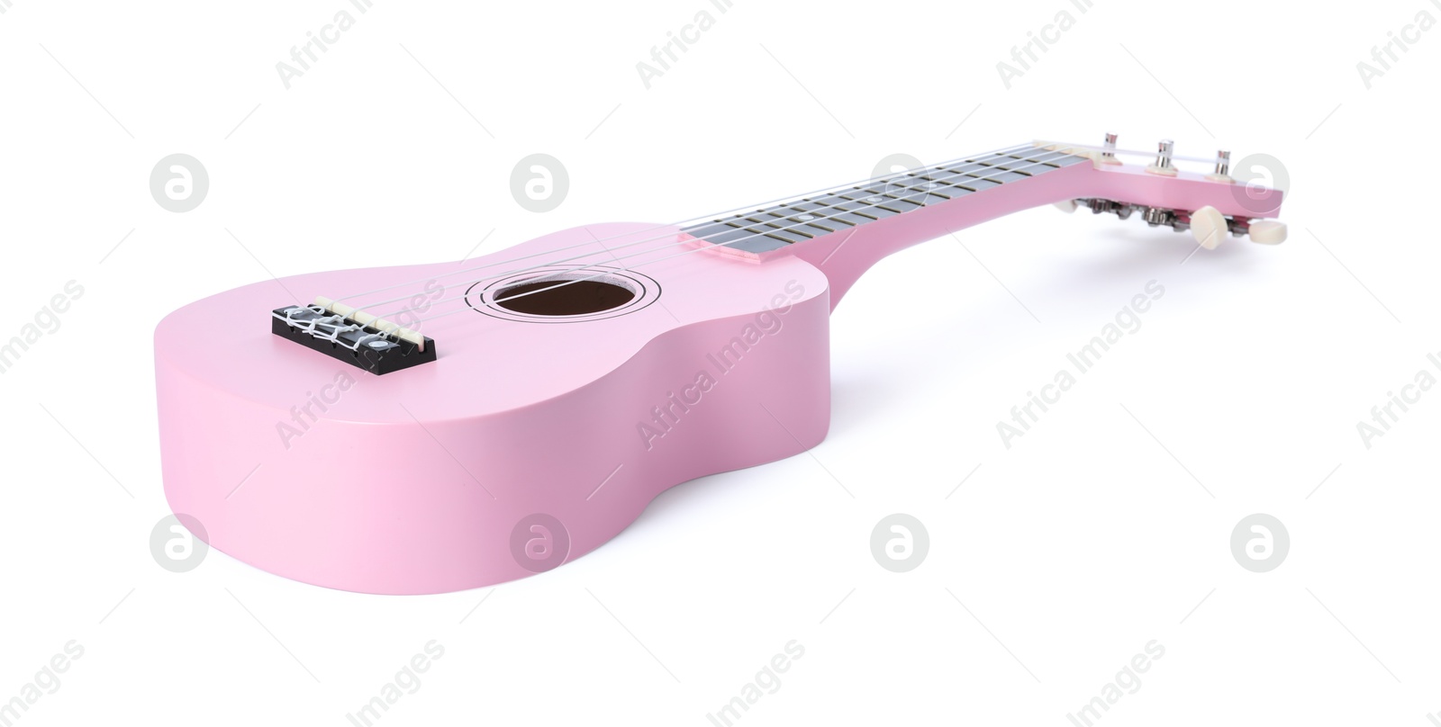 Photo of One ukulele isolated on white. String musical instrument