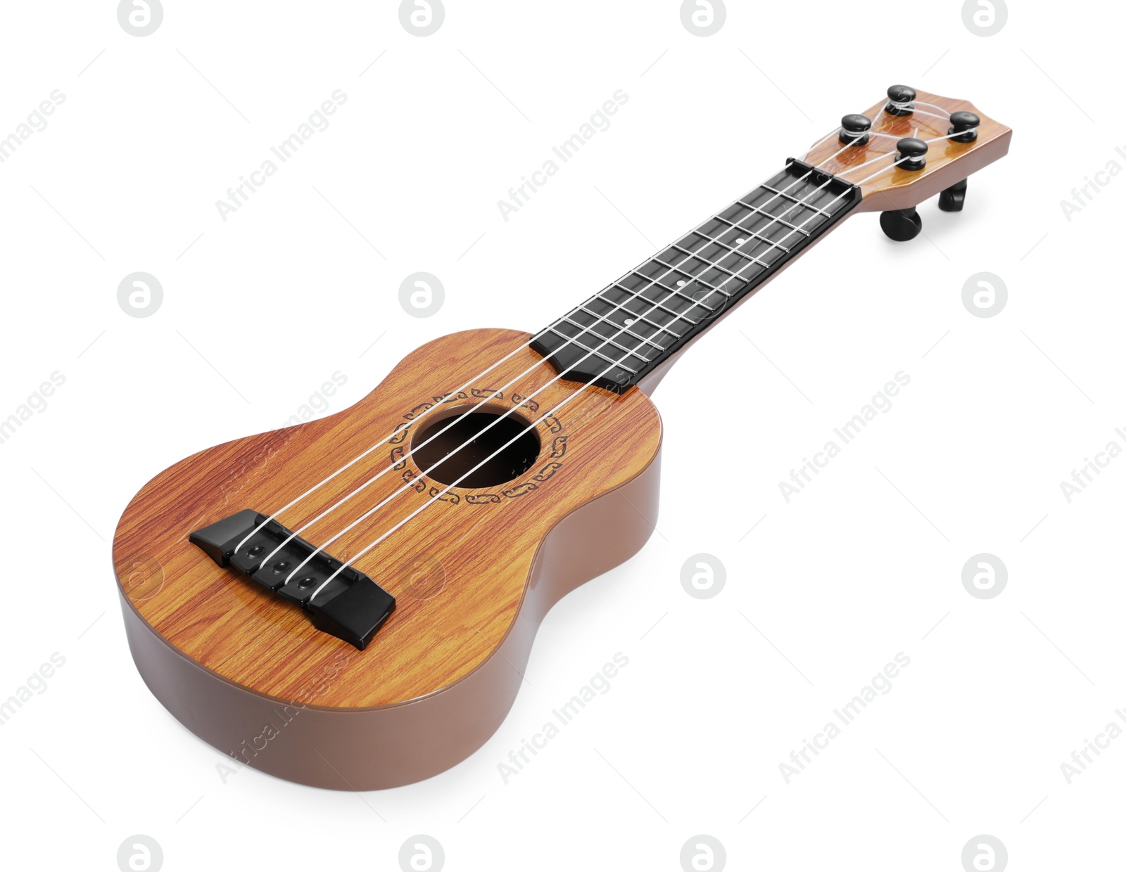 Photo of One ukulele isolated on white. String musical instrument