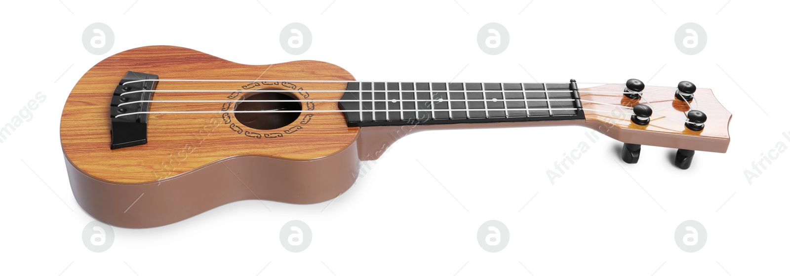 Photo of One ukulele isolated on white. String musical instrument