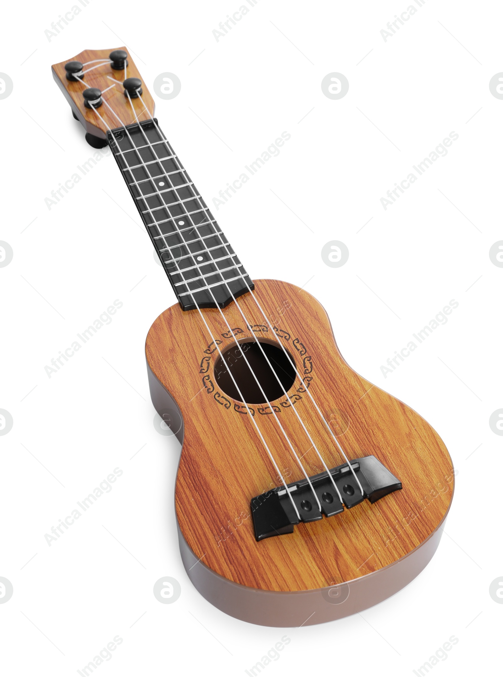 Photo of One ukulele isolated on white. String musical instrument