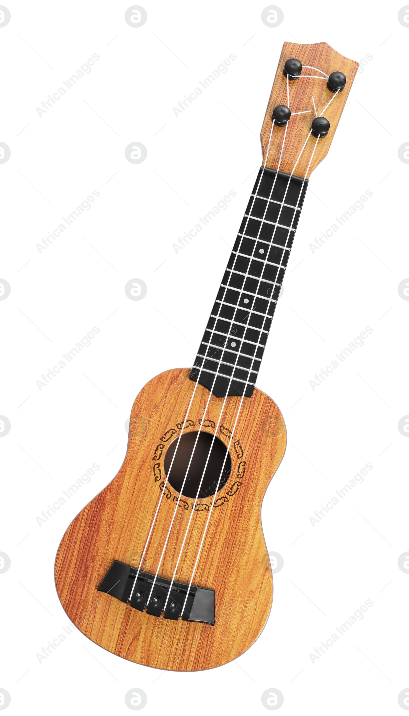 Photo of One ukulele isolated on white, top view. String musical instrument