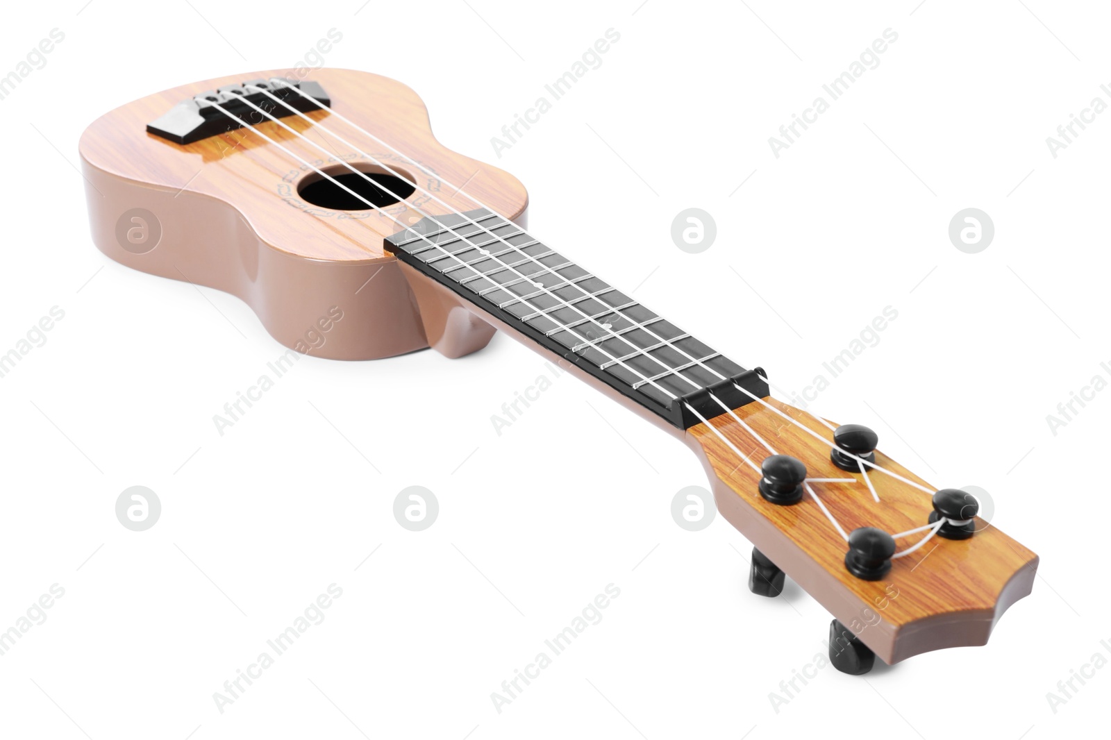 Photo of One ukulele isolated on white. String musical instrument