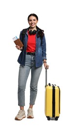 Young tourist with suitcase and passport on white background