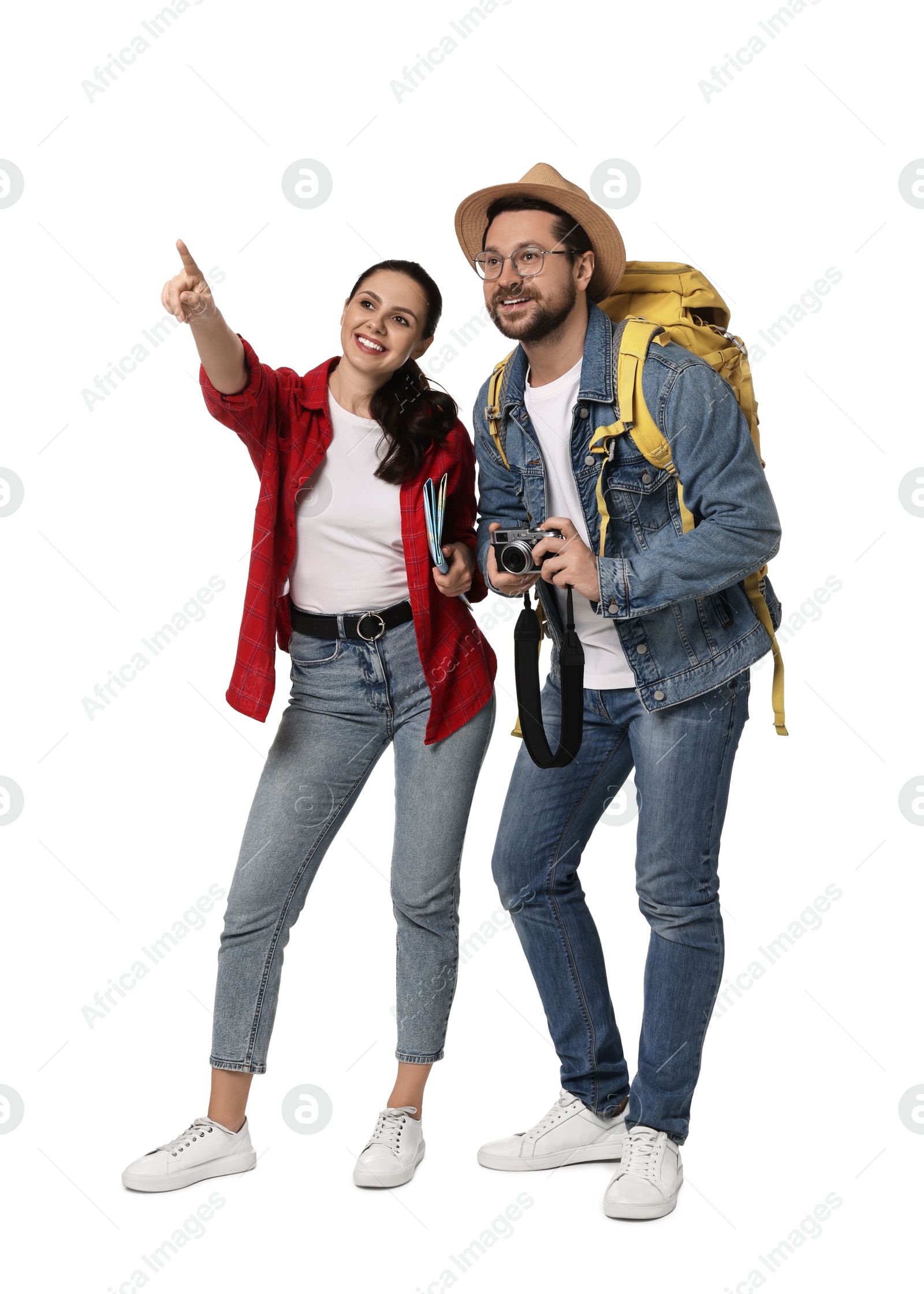 Photo of Tourism. Happy couple with backpack and camera on white background