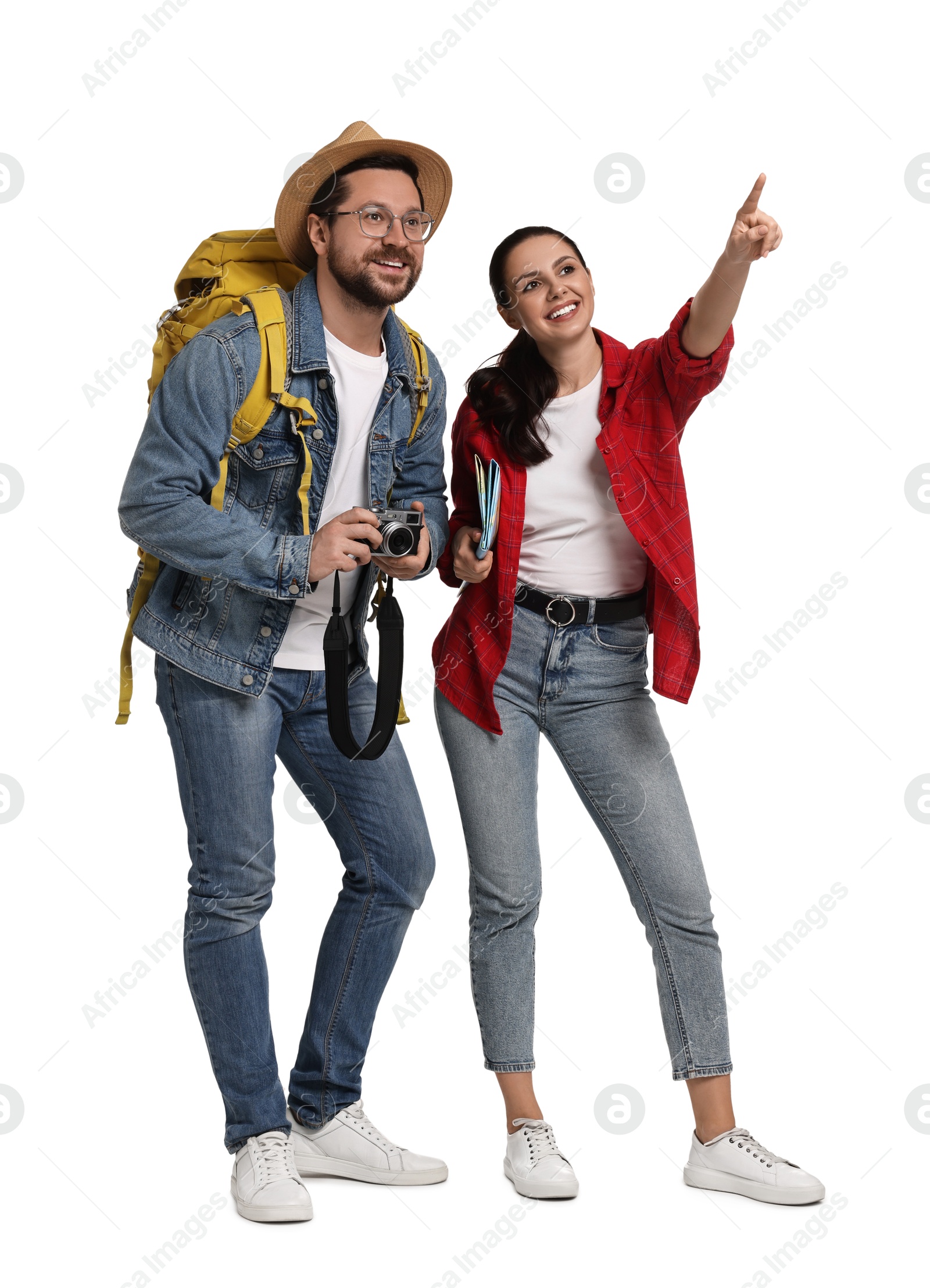 Photo of Tourism. Happy couple with backpack and camera on white background