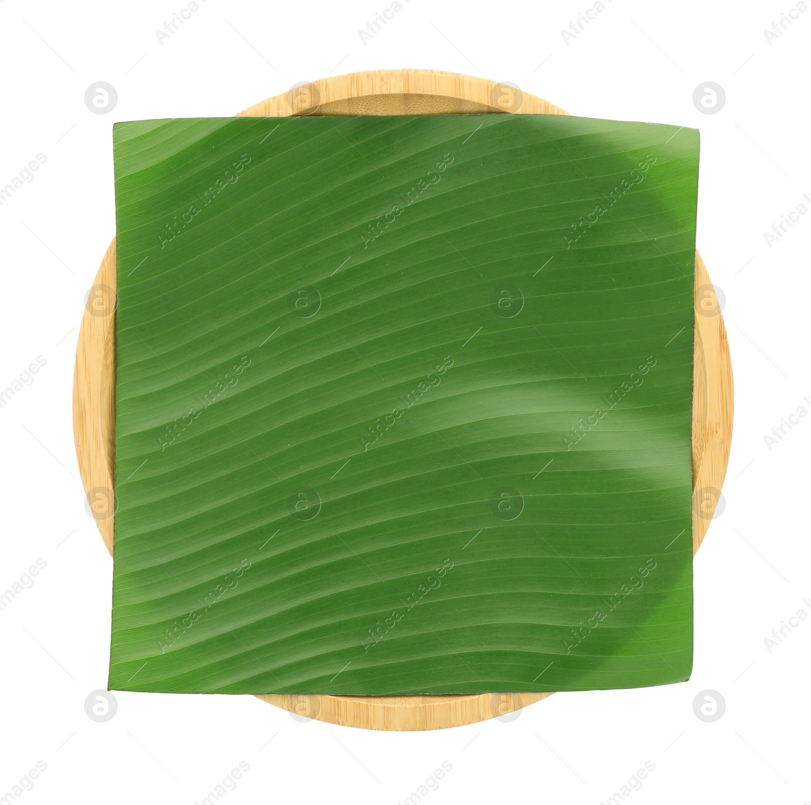 Photo of Piece of banana leaf isolated on white, top view. Traditional meal serving