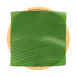 Photo of Piece of banana leaf isolated on white, top view. Traditional meal serving