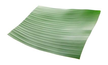 Photo of Piece of banana leaf isolated on white. Traditional meal serving