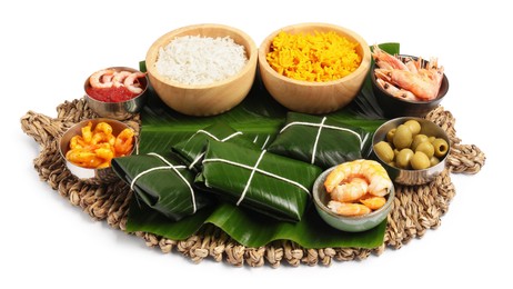 Photo of Cut banana leaves with different food isolated on white. Healthy eco serving