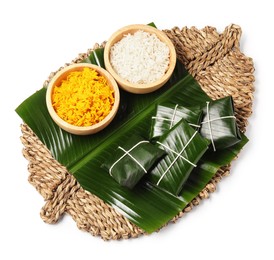 Photo of Cut banana leaves with rice isolated on white, top view. Healthy eco serving