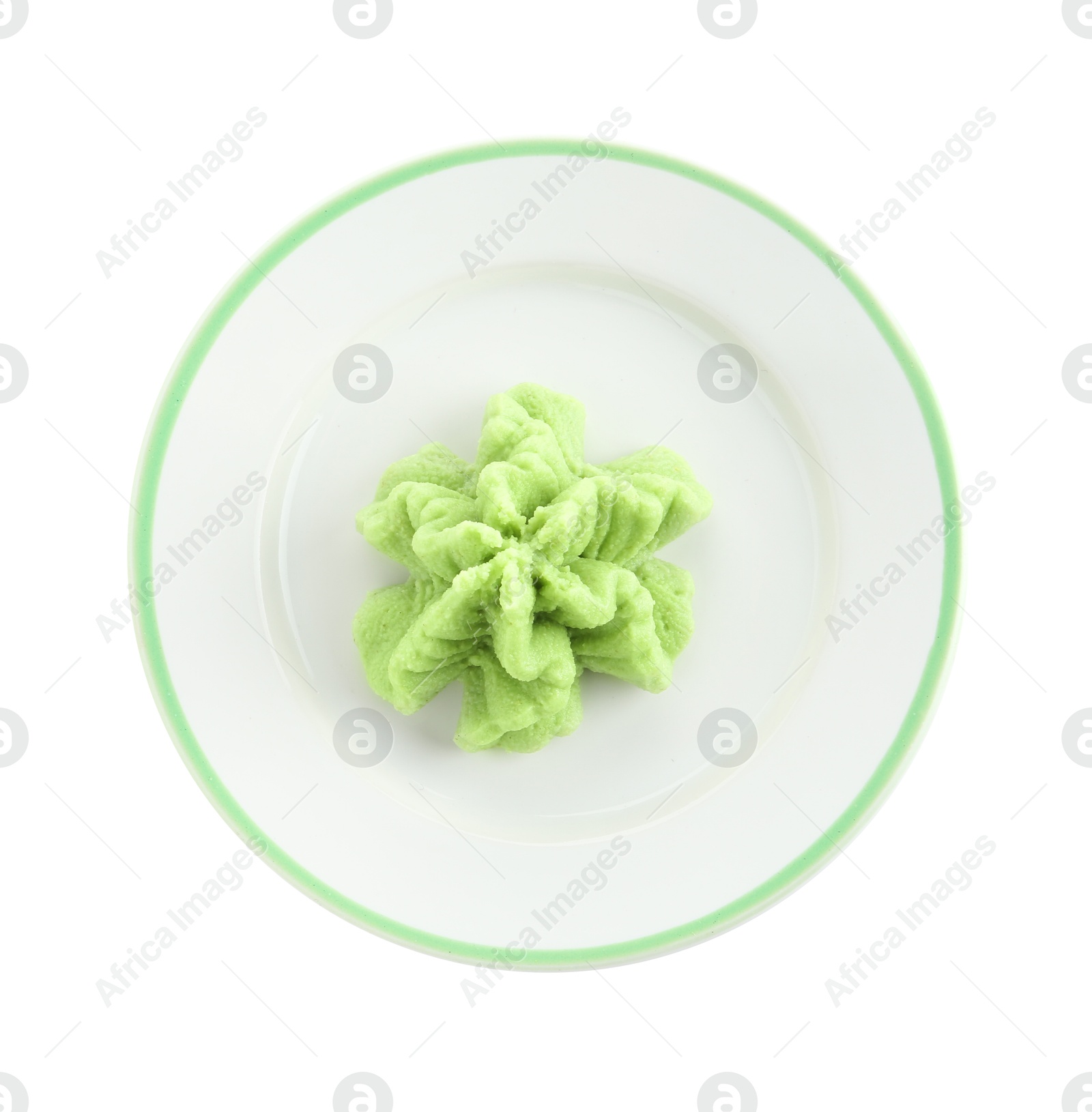 Photo of Plate with hot wasabi paste isolated on white, top view