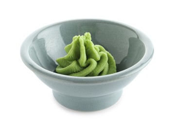 Photo of Hot wasabi paste in bowl isolated on white