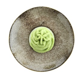 Photo of Plate with hot wasabi paste isolated on white, top view