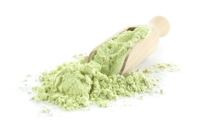 Photo of Scoop and dry wasabi powder isolated on white