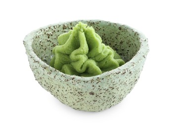 Photo of Hot wasabi paste in bowl isolated on white