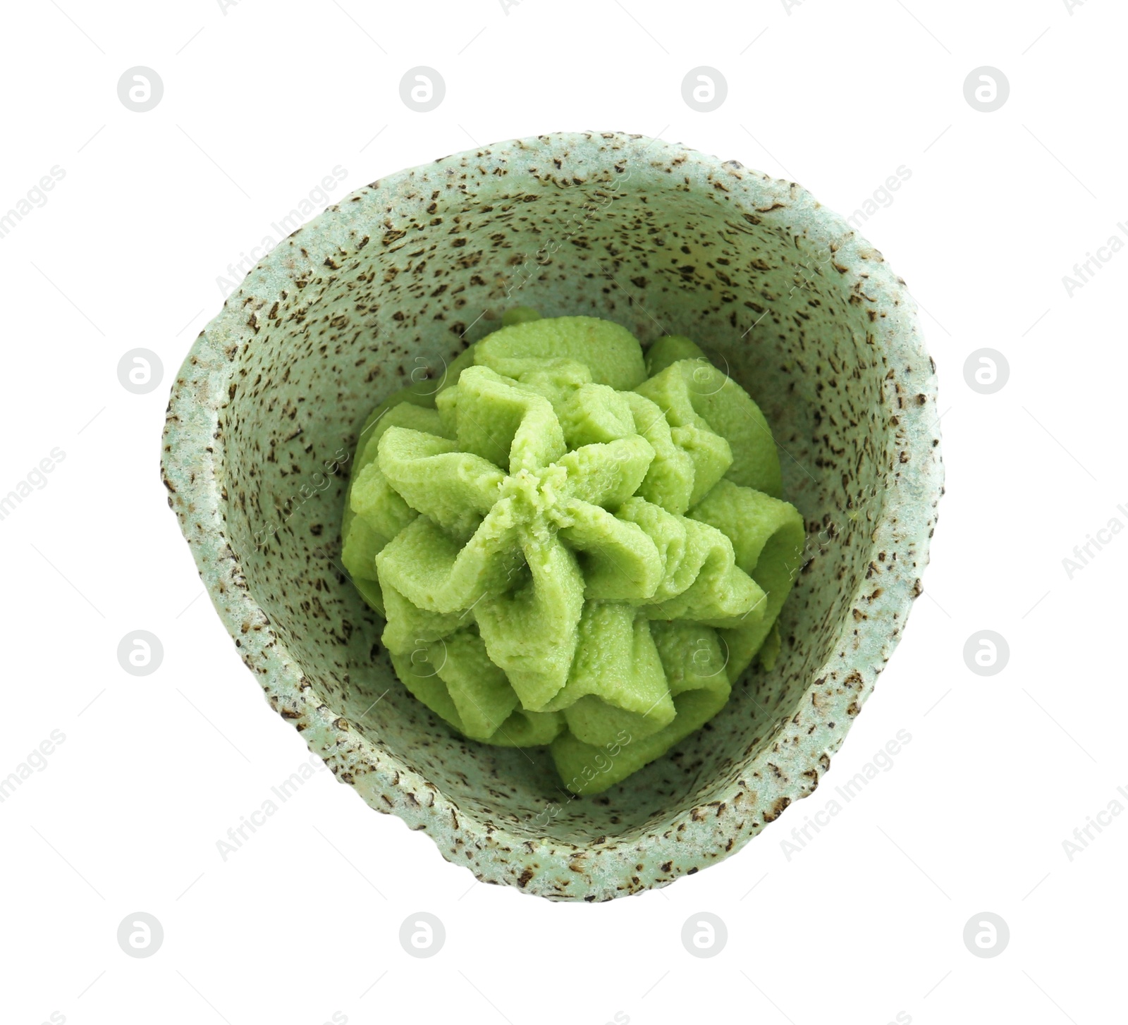 Photo of Hot wasabi paste in bowl isolated on white, top view