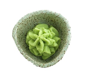 Photo of Hot wasabi paste in bowl isolated on white, top view