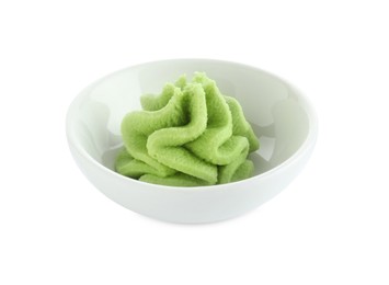 Photo of Hot wasabi paste in bowl isolated on white