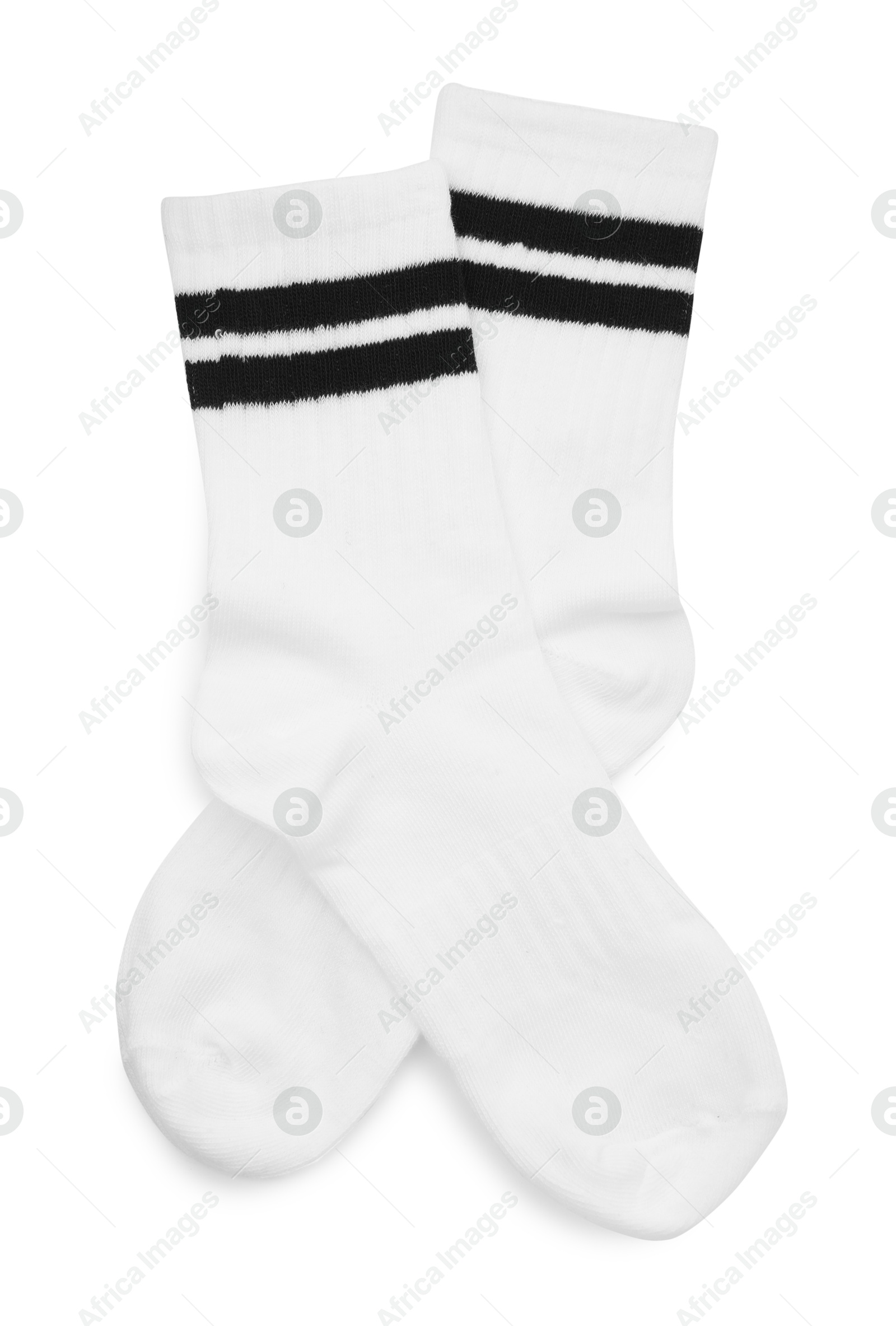 Photo of Pair of soft socks isolated on white, top view