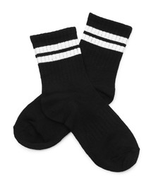 Photo of Pair of soft socks isolated on white, top view