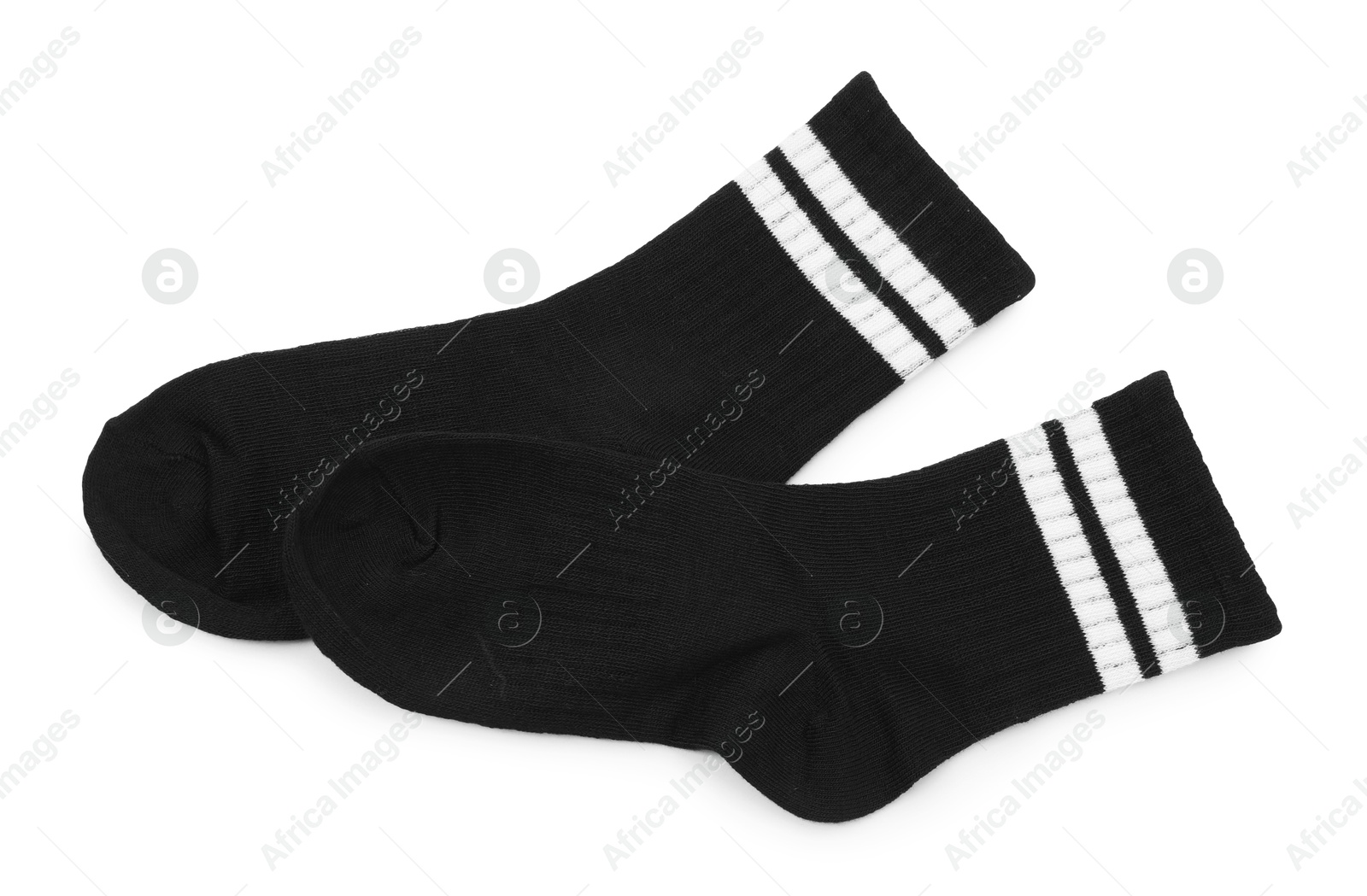 Photo of Pair of soft socks isolated on white, top view