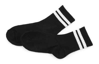 Photo of Pair of soft socks isolated on white, top view